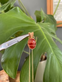 Image 4 of Gold Banded Carnelian Oval Crystal Necklace