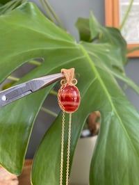 Image 5 of Gold Banded Carnelian Oval Crystal Necklace