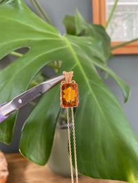 Image 1 of Gold Amber & Flower Carving Crystal Necklace