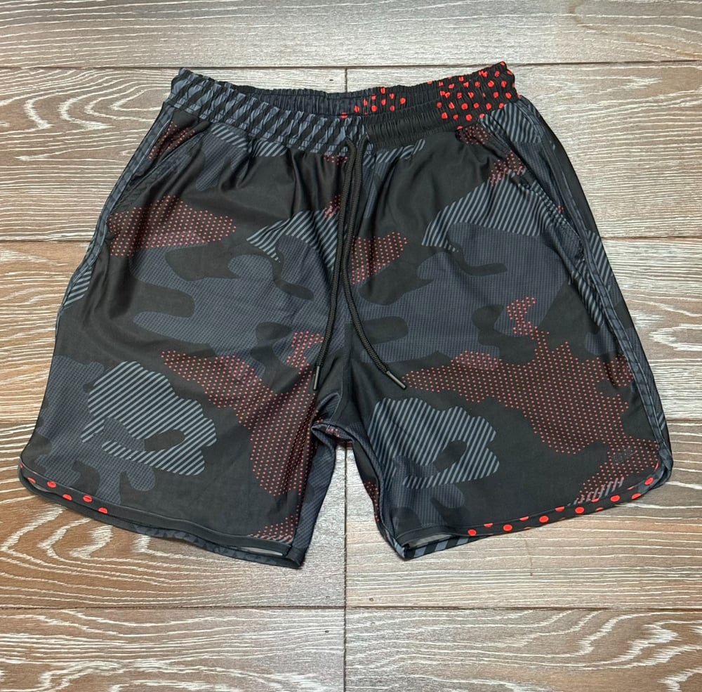 Image of HUI PŪ MEN'S DRI FIT SHORTS