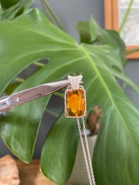 Image 2 of Silver Amber & Flower Carving Crystal Necklace 
