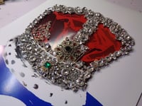 Image 5 of Emeralds on blue crown