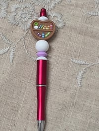 Red heart shaped bookshelf pen 