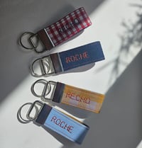 Image 1 of Small personalised key ring / bag charm with 1 embroidered name / word