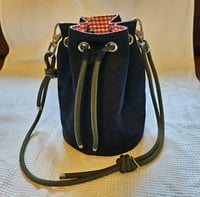 Image 2 of Padded bucket bag with an adjustable crossbody or shoulder strap.