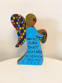 Image 1 of What are they doing in heaven today?3