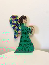 Image 1 of What are they doing in heaven today? 5