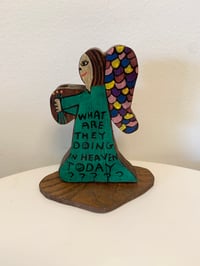 Image 1 of What are they doing in heaven today? 6