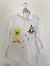 Image 1 of I tawt I taw a puddy tat