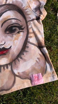 Image 3 of Flower face baby T size M