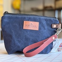 Image 1 of Navy and Red Fire Hose Clutch