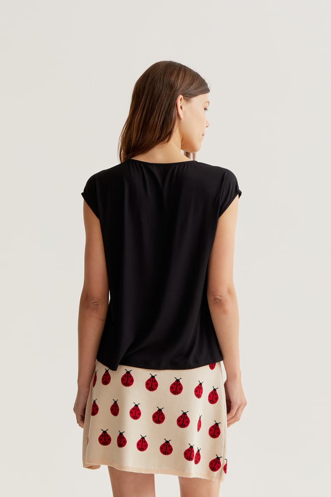 Image of Camiseta negra manga sisa