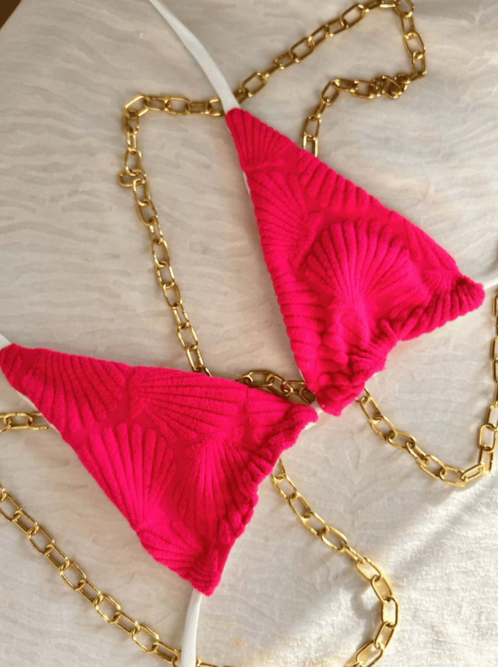 Image of the fuchsia reversible bikini set