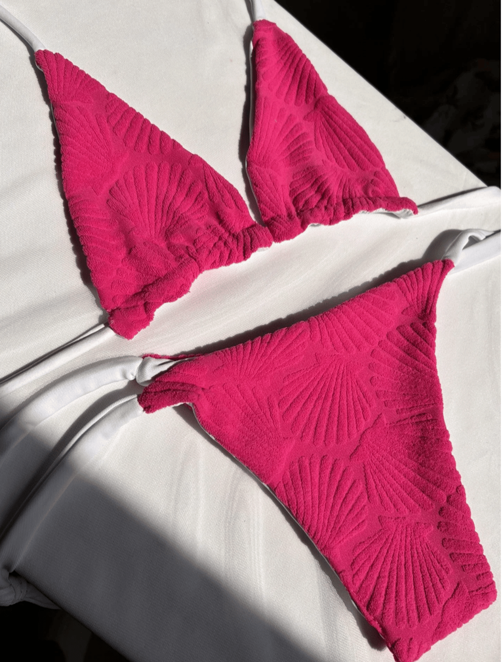 Image of the fuchsia reversible bikini set