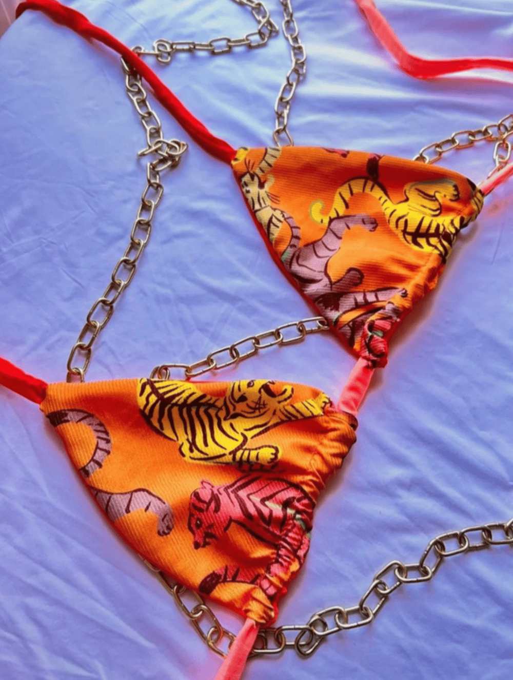 Image of the orange tiger reversible bikini top