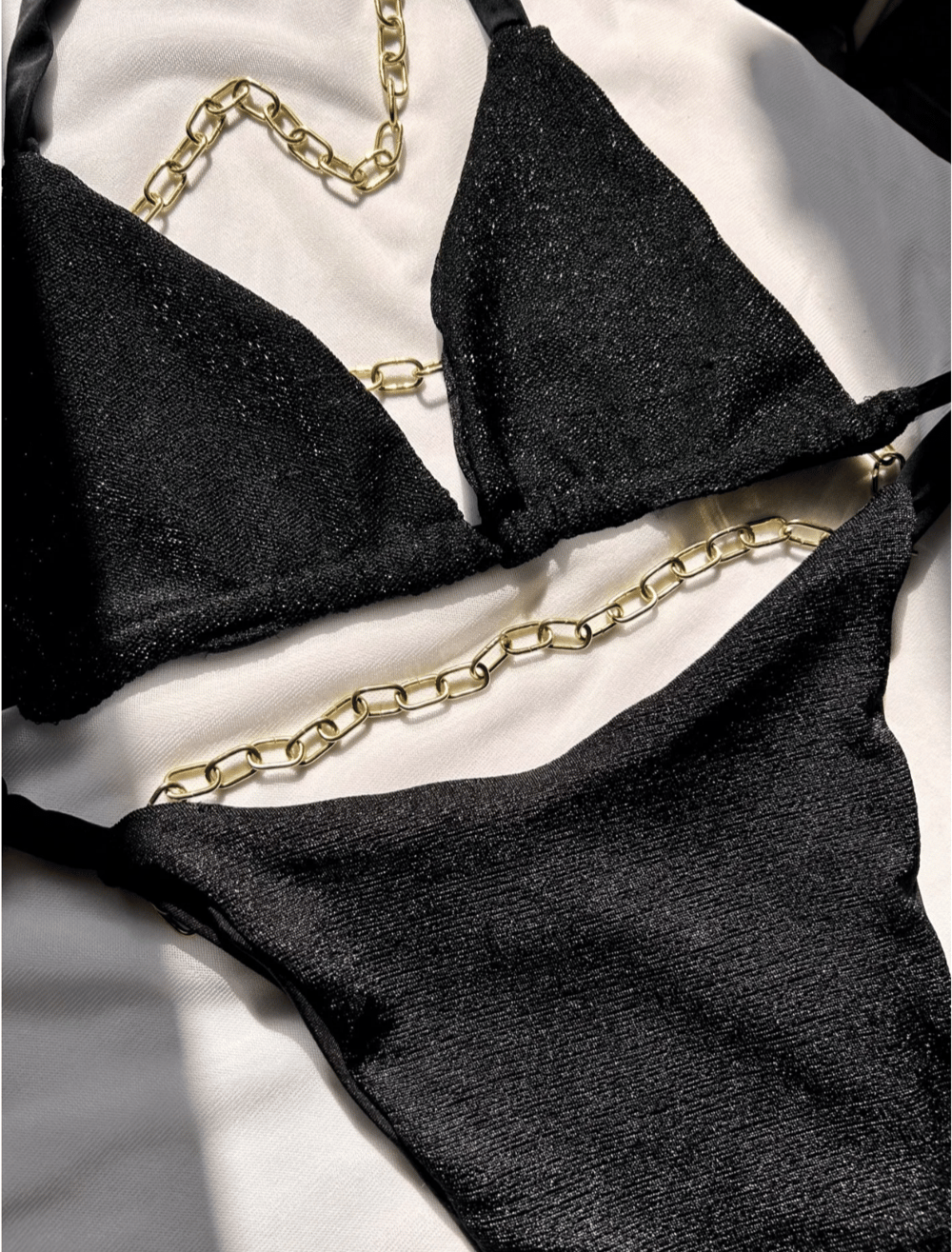 Image of the noir shiny reversible bikini set