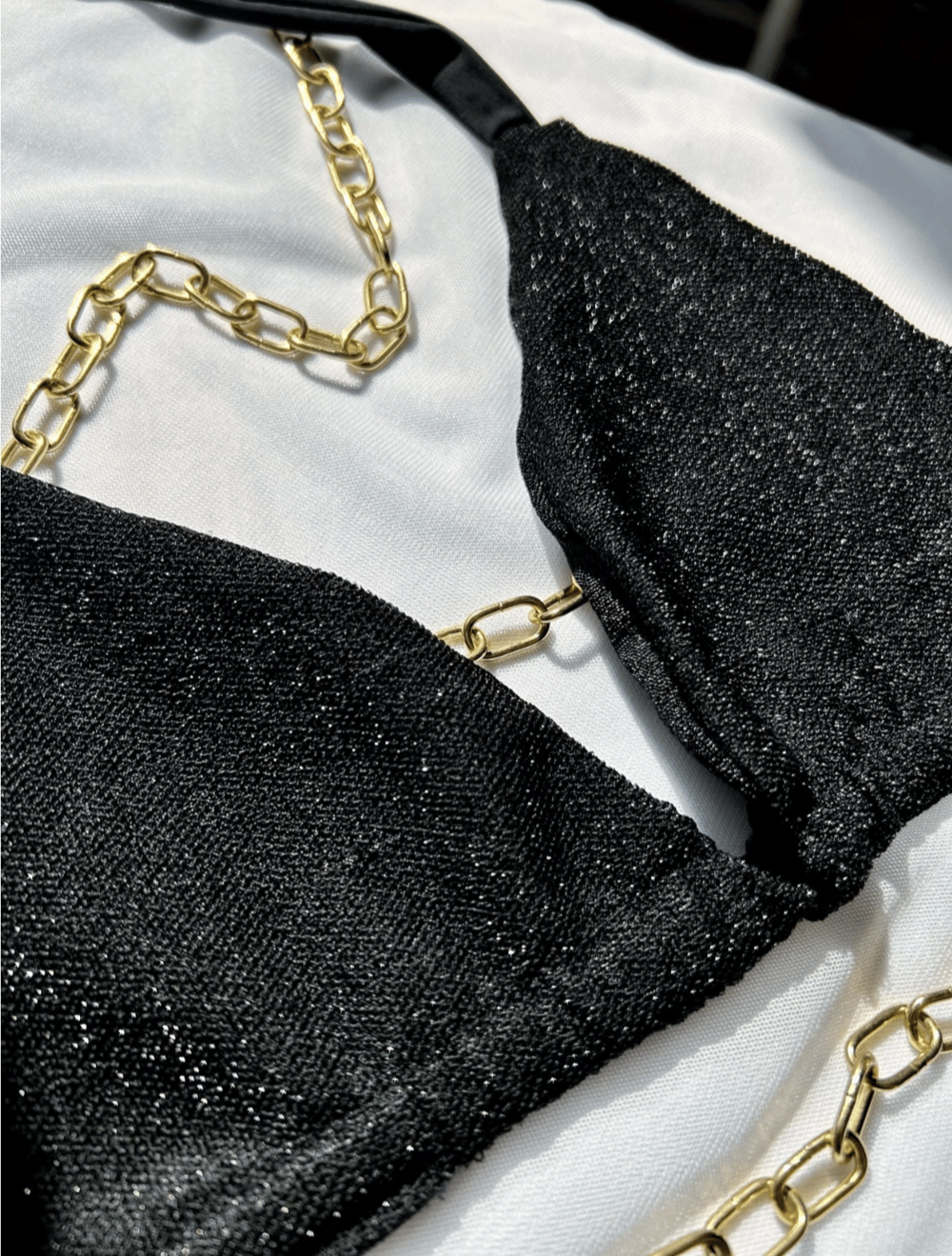 Image of the noir shiny reversible bikini set