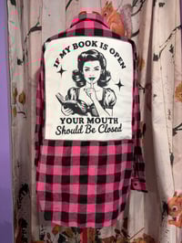 Image 1 of Book is open 