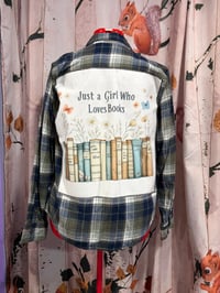 Image 1 of Girl who loves books