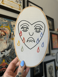 EMBROIDERED CRYING HEART