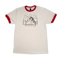 flowers taped to pens - discography shirt