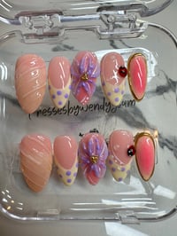 Image 1 of GARDEN LADY 2