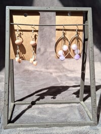 Image 1 of dangle me along