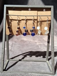 Image 2 of dangle me along