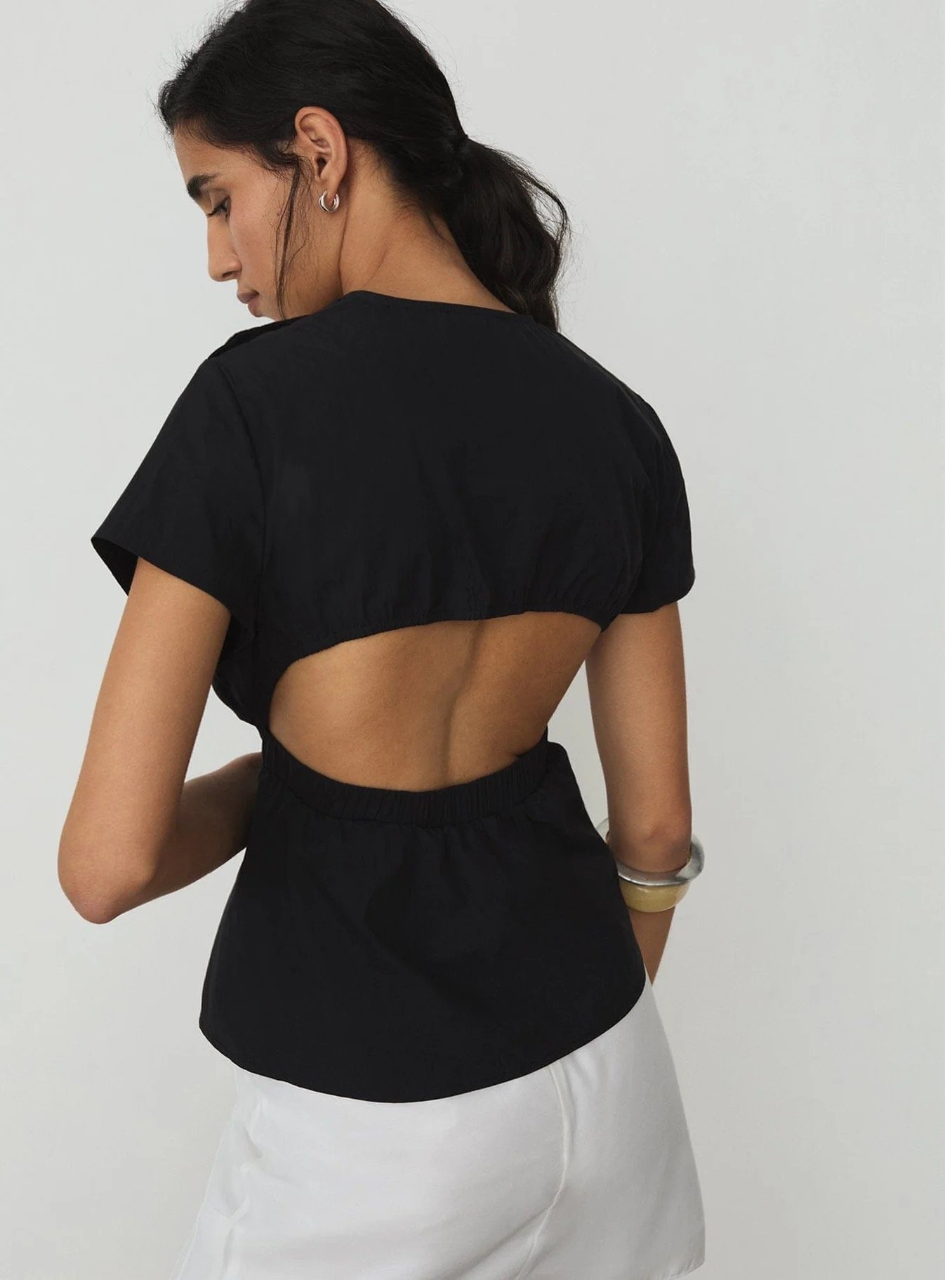 Image of LAAGAM RAVEN ASYMMETRIC BLOUSE