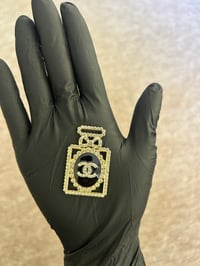 1x C.c Gold metal perfume flat back charm