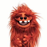 The CHOMPER Critter Monster Puppet in Burnt Orange