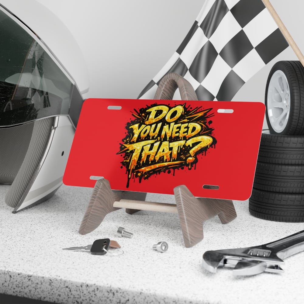 Image of Vanity Plate — Bold Red "Do You Need That?" Graphic License Plate