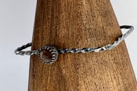 Image 1 of Blackened silver bangle with a rose cut Rutilated Quartz