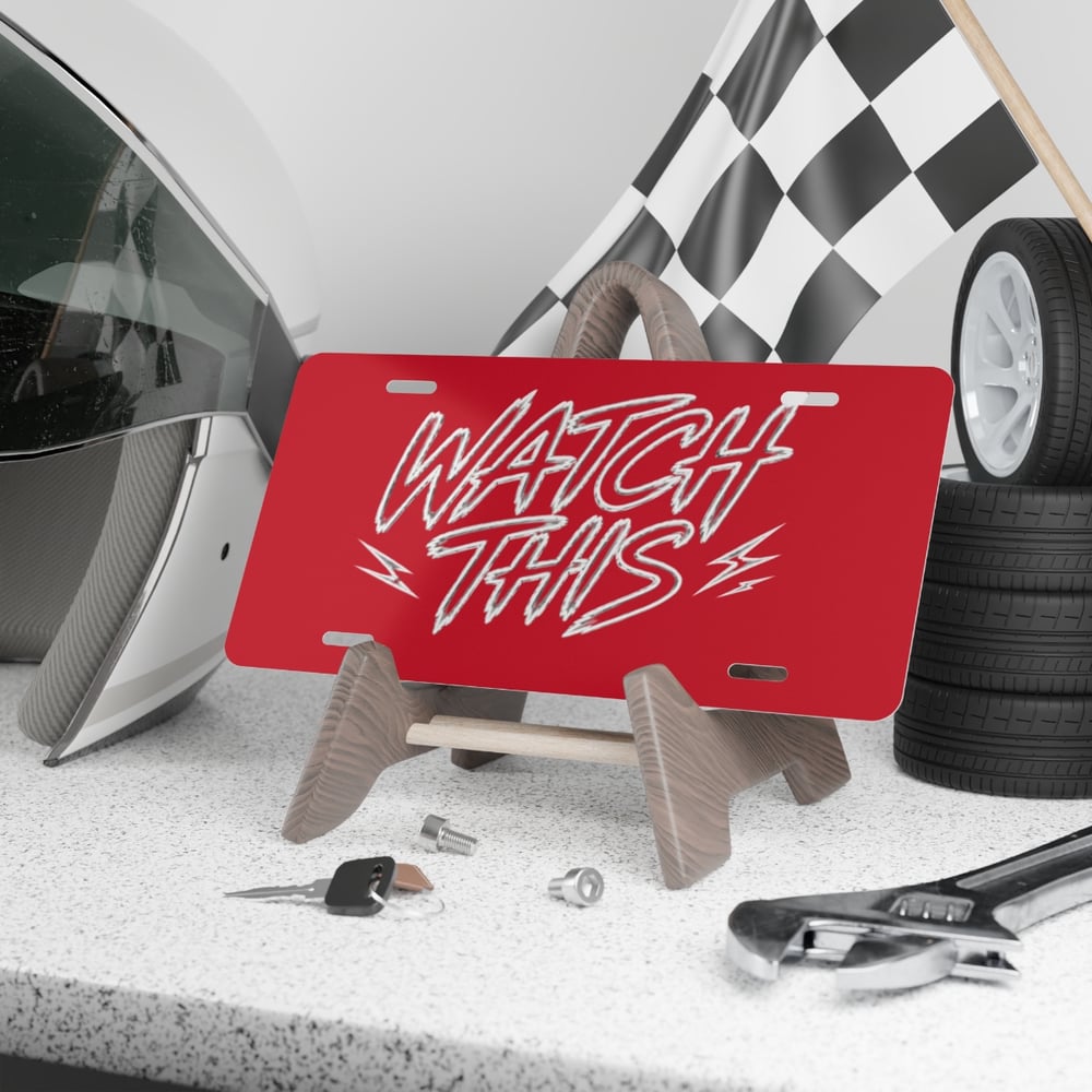 Image of Vanity Plate - "WATCH THIS" Red Aluminum License Plate