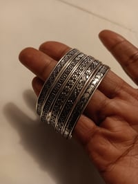 Image 2 of SET OF 5 BANGLE BRACELETS WITH DETAILED DESIGNS