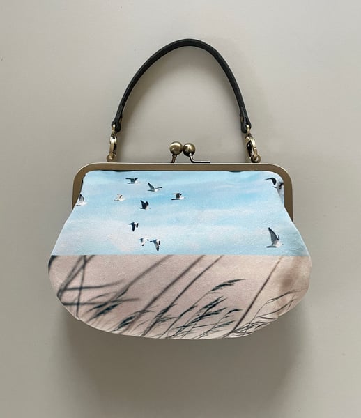 Image of Birds and reeds, velvet clutch bag with optional strap