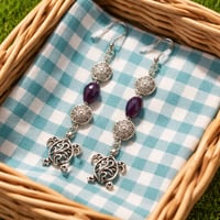SILVER DANGLE EARRINGS WITH A BLUE TEARDROP AND TURTLE DANGLE