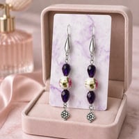 PURPLE AND SILVER EARRINGS WITH PURPLE TEARDROP AND FLOWER DANGLE