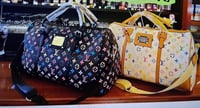 LV TRAVEL DUFFLE 