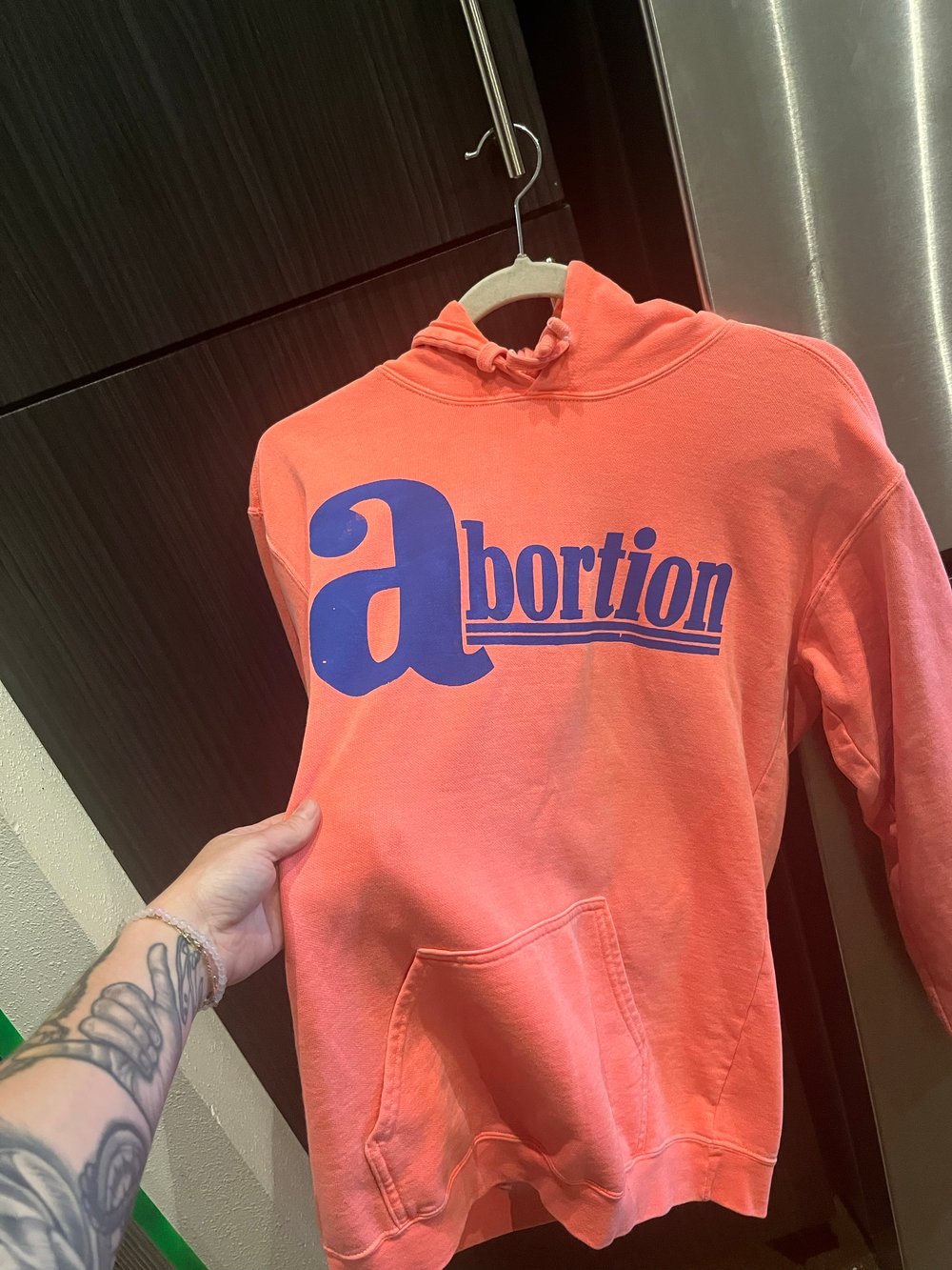 S NEON RED ORANGE HOODIE "ABORTION" BLUE INK 