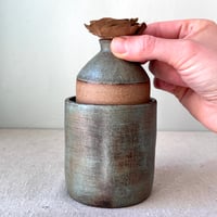 Image 4 of a rustic green grav ii