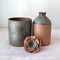 Image 1 of a rustic green grav ii