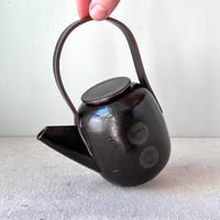 Image 2 of a black button teapot
