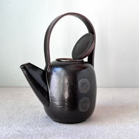 Image 5 of a black button teapot
