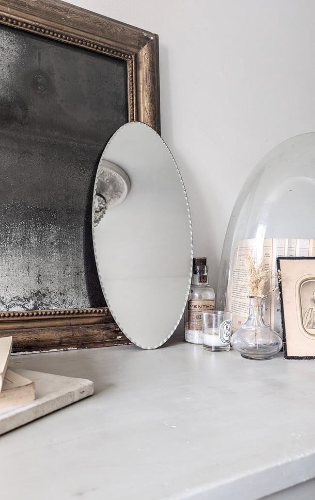 Miroir ovale ciselé 
