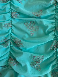 Image 3 of Vintage Y2K deadstock turquoise ruched handkerchief hem cami with silver butterflies 