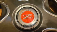 Image 12 of 240z Hubcap - set of 4