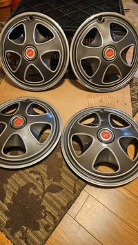 Image 1 of 240z Hubcap - set of 4