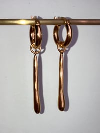 Image 1 of long gold drop