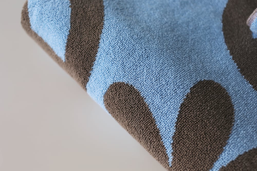 Image of PEACE FLOWER Towel<div> Lake & Cocoa </div>